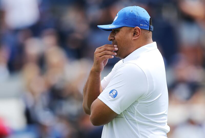 BYU coach Kalanio Sitake watches warm-ups in Provo on Saturday, Aug. 26, 2017.