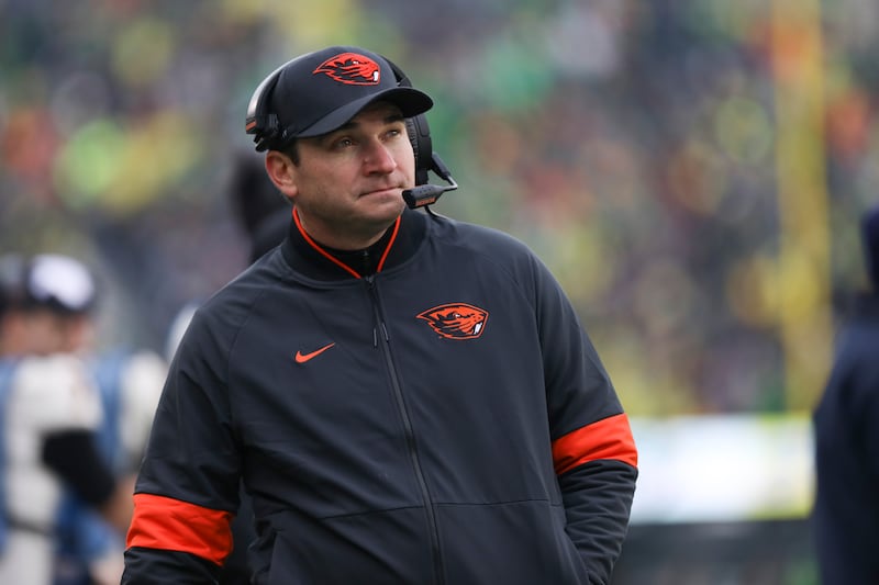 Oregon State coach Jonathan Smith looks at scoreboard during game against Oregon in Eugene, Ore., Saturday, Nov. 30, 2019.