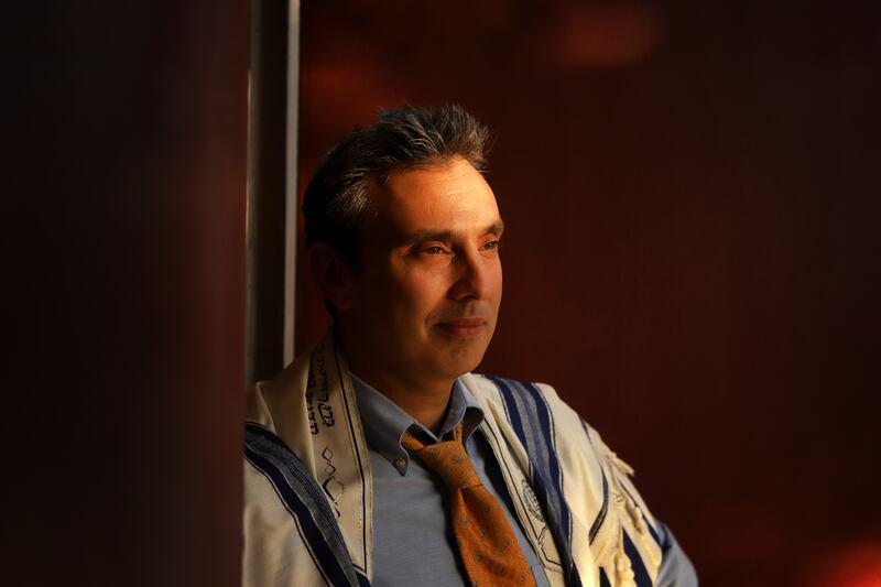 Rabbi David Markus prepares to lead a Shabbat service at Temple Beth-El on City Island, Bronx, New York, on Friday evening, May 25, 2018. Rabbi Markus is a judicial referee for the New York Supreme Court who gives talks on "harvesting your life wisdom and