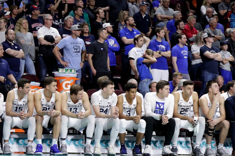 BYU's bench watches during the final moments of game against Saint Mary's in the West Coast Conference tournament, Monday, March 9, 2020, in Las Vegas. Saint Mary's won 51-50.