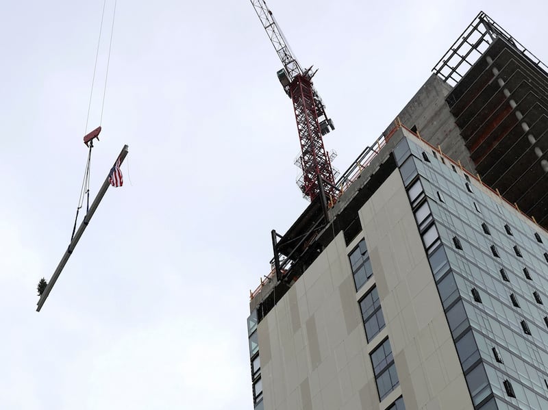 The final beam is raised at Astra Tower in Salt Lake City on Thursday. When finished, the 40-story Astra Tower in the downtown area will be Utah’s tallest high-rise at 450 feet.