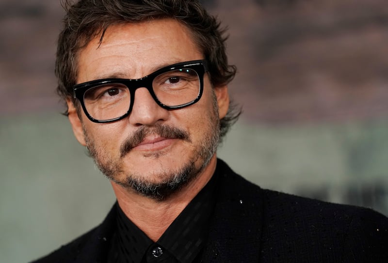 Pedro Pascal poses at the premiere of the HBO series “The Last of Us” at the Regency Village Theatre in Los Angeles.