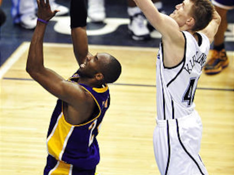 Kobe Bryant gets his shot blocked by Andrei Kirilenko in the 4th quarter. The Jazz beat the Lakers knotting the series at 2-2.