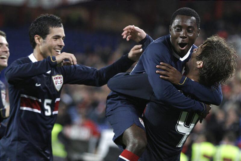 Benny Feilhaber, left, Freddy Adu and Michael Bradley celebrate their first goal during a Euro 2008 test match against Switzerland Wednesday night in Basel, Switzerland. The Americans won 1-0.