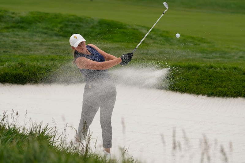 Grace Summerhays hits out of a bunker on the 13th hole during a practice round for the U.S. Women’s Open golf tournament.