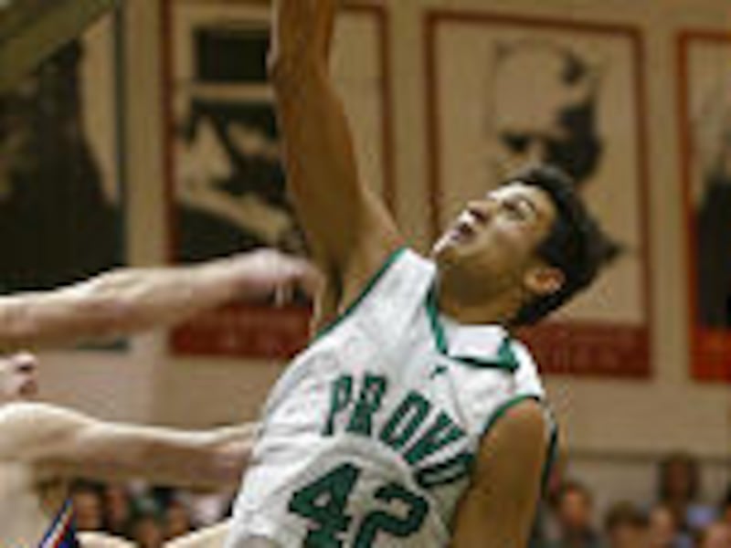Provo High School's Tai Wesley drives to the basket in a recent game.
