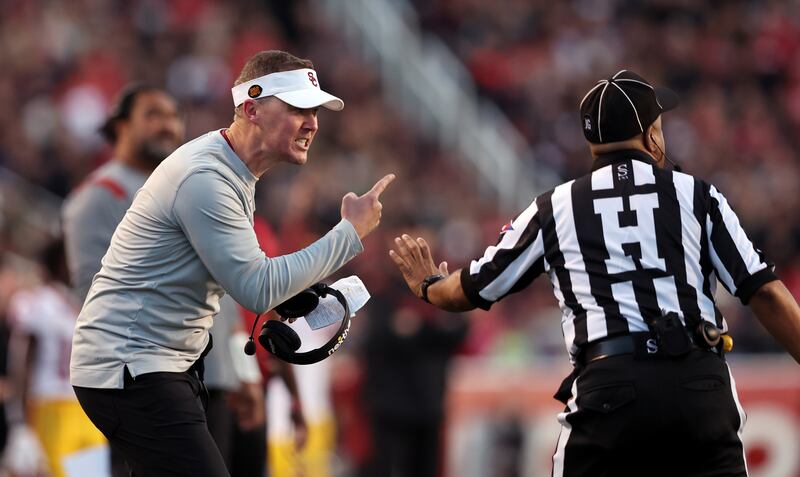 USC Trojans head coach Lincoln Riley argues with an official as Utah and USC play at Rice-Eccles Stadium in Salt Lake City on Saturday, Oct. 15, 2022.