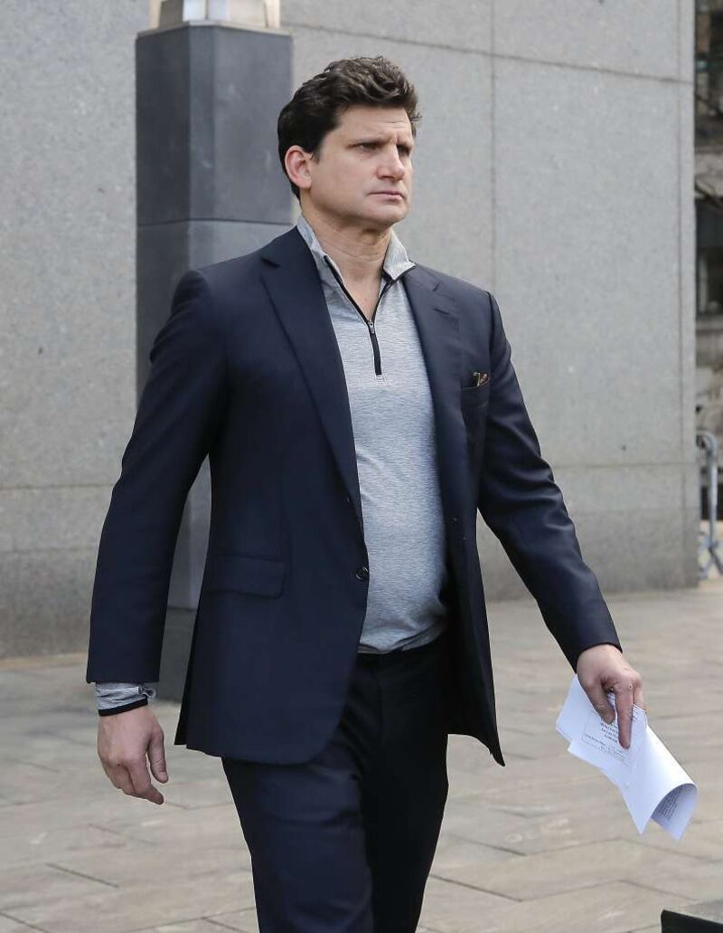 Gordon Caplan of Greenwich, Conn., who was co-chairman of the international law firm Willkie Farr & Gallagher until he was placed on leave, is accused of paying $75,000 to get a test supervisor to correct the answers on his daughter's ACT exam after she t