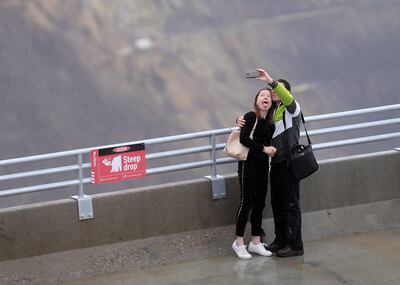 Ineke Buurma-Van der Veeken and Rob Van der Veeken take a selfie at the Rio Tinto Kennecott Visitor Experience at the Bingham Canyon Mine on Friday, April 26, 2019.