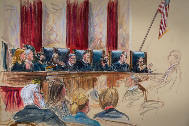 In this drawing by court artist Dana Verkouteren, the Supreme Court hears arguments on the opening day of its new term on Monday, Oct. 3, 2022.