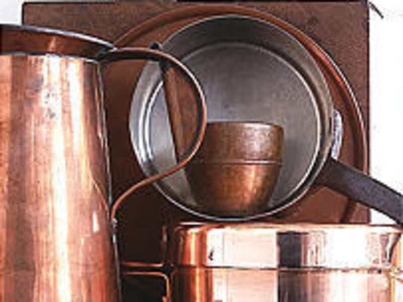 Copper pots conduct heat very well and look great in the kitchen.