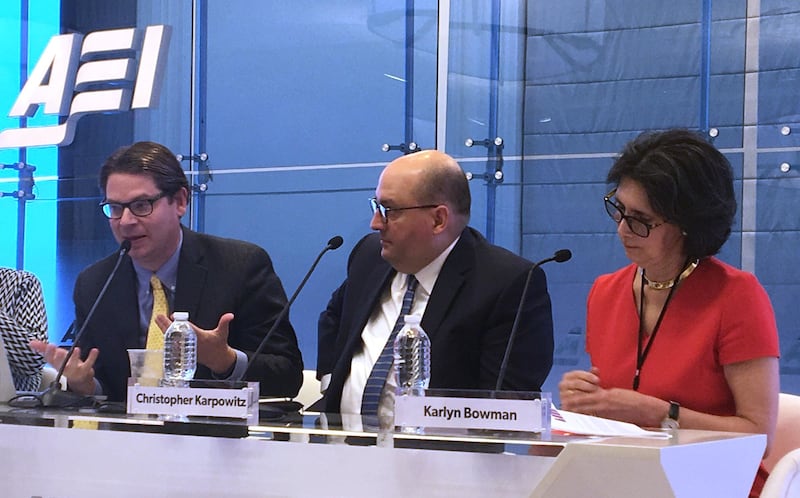 Bradford Wilcox, National Marriage Project; Christopher Karpowitz, BYU; and Karlyn Bowman, American Enterprise Institute, discuss findings of the American Family Survey on Thursday, Nov. 16, at the American Enterprise Institute in Washington, D.C.