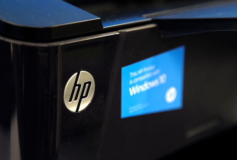 This May 24, 2016, photo shows an HP printer on display at a store in North Andover, Mass.