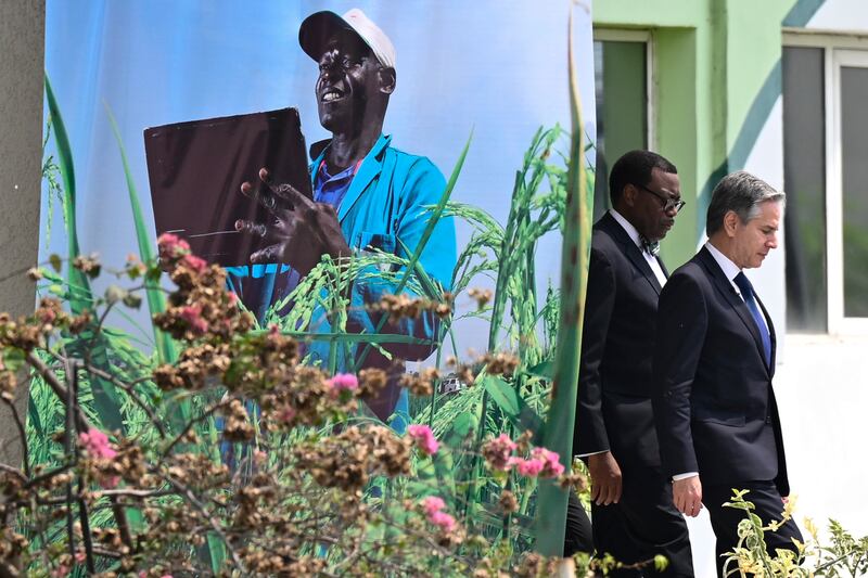 U.S. Secretary of State Antony Blinken, right, and the president of the African Development Bank Group, Akinwumi Adesina, left.