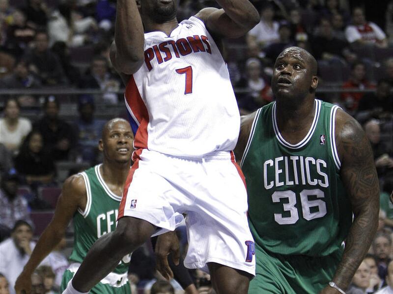 Detroit Pistons guard Ben Gordon (7) drives on Boston Celtics center Shaquille O'Neal (36) and guard Ray Allen (20) in the second half of an NBA basketball game in Auburn Hills, Mich., Wednesday, Dec. 29, 2010. Detroit won 104-92. (AP Photo/Paul Sancya)