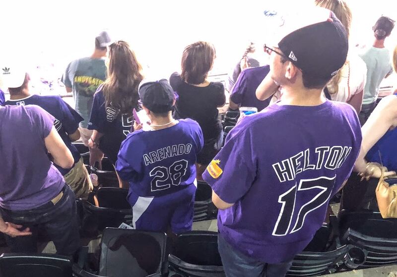 The Coors Field stands are full of Helton (the old) and Arenado (the new) jerseys.