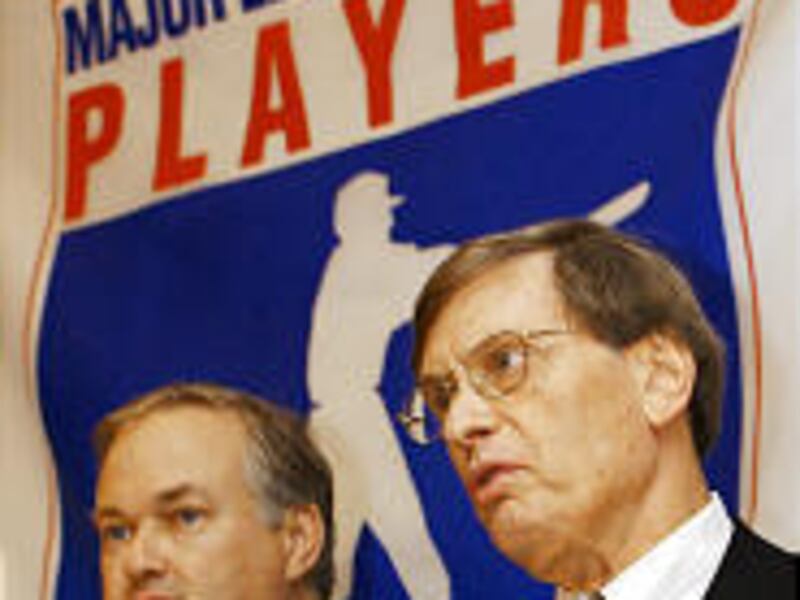 Baseball Commissioner Bud Selig, right, and Donald Fehr, leader of the Baseball Players Association, address the media in this 2002 photo.