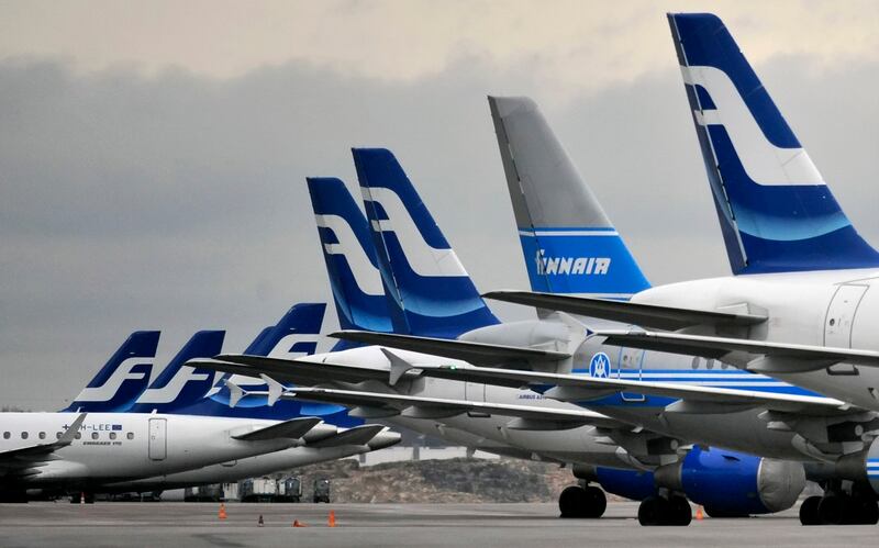 Passenger planes of the Finnish national airline company Finnair stand on the tarmac at Helsinki international airport in Helsinki on Nov. 16, 2009.
