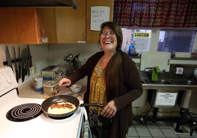 Monterra Buckner cooks a quesadilla at The INN Between in Salt Lake City on Monday, Dec. 18, 2017.