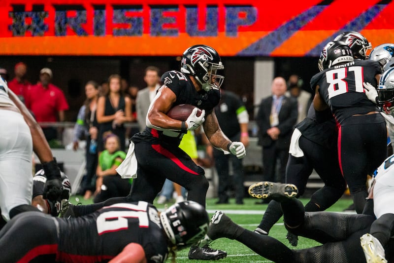 Atlanta Falcons running back Tyler Allgeier (25) runs the ball towards the end zone for a touchdown during the second half of an NFL football game against the Carolina Panthers, Sunday, Sep. 10, 2023, in Atlanta. The Atlanta Falcons won 24-10. (AP Photo/Danny Karnik)