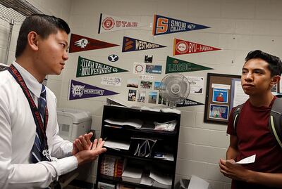 Sambat Kim, a college access adviser with the Utah College Advising Corps, talks with 10th-grader Sam Morales-Madrid at Hunter High School in West Valley City on Thursday, Sept. 20, 2018. Morales-Madrid is interested in pursuing a career in aerospace engi