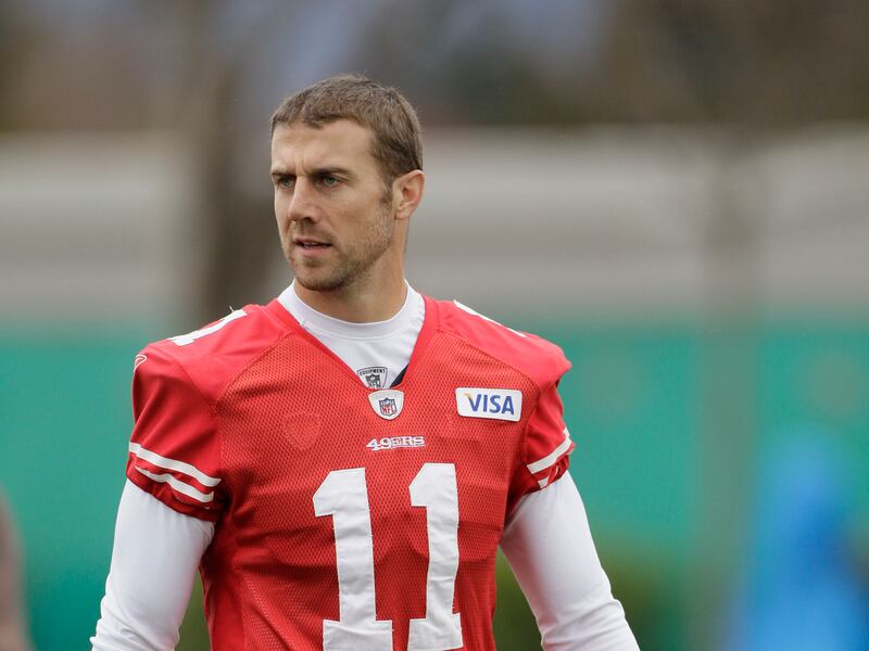 San Francisco 49ers quarterback Alex Smith walks off the field after NFL football practice in Santa Clara, Calif., Friday, Jan. 20, 2012. The 49ers are preparing to host the New York Giants in the NFC championship game on Sunday. (AP Photo/Eric Risberg)