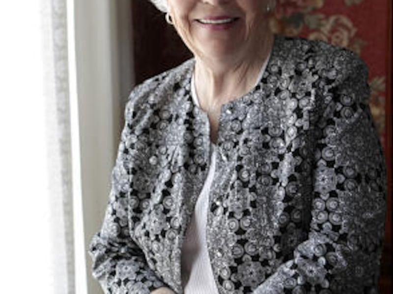 Mother of the Year Dixie Clifford stands in her home in Orem.