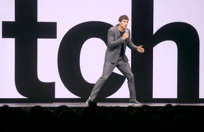 Ashton Kutcher speaks during the Qualtrics summit at the Salt Palace Convention Center in Salt Lake City on Wednesday, March 6, 2019.