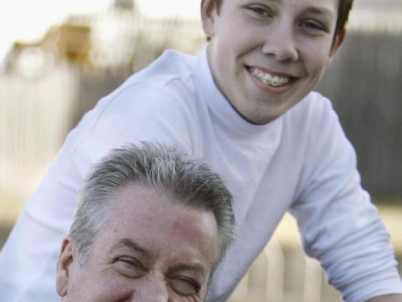 FILE - In this March 20, 2008 file photo, former Bolingbrook police officer Drew Peterson poses with his son, Thomas, at their family home in Bolingbrook, Ill. On Wednesday, Aug. 29, 2012, Thomas Peterson, now 19, testified at the murder trial of his fath
