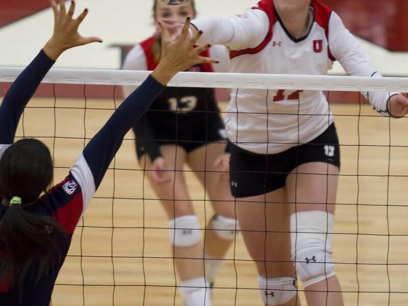 Erin Redd-Brandon spikes the ball during a Utah volleyball match.