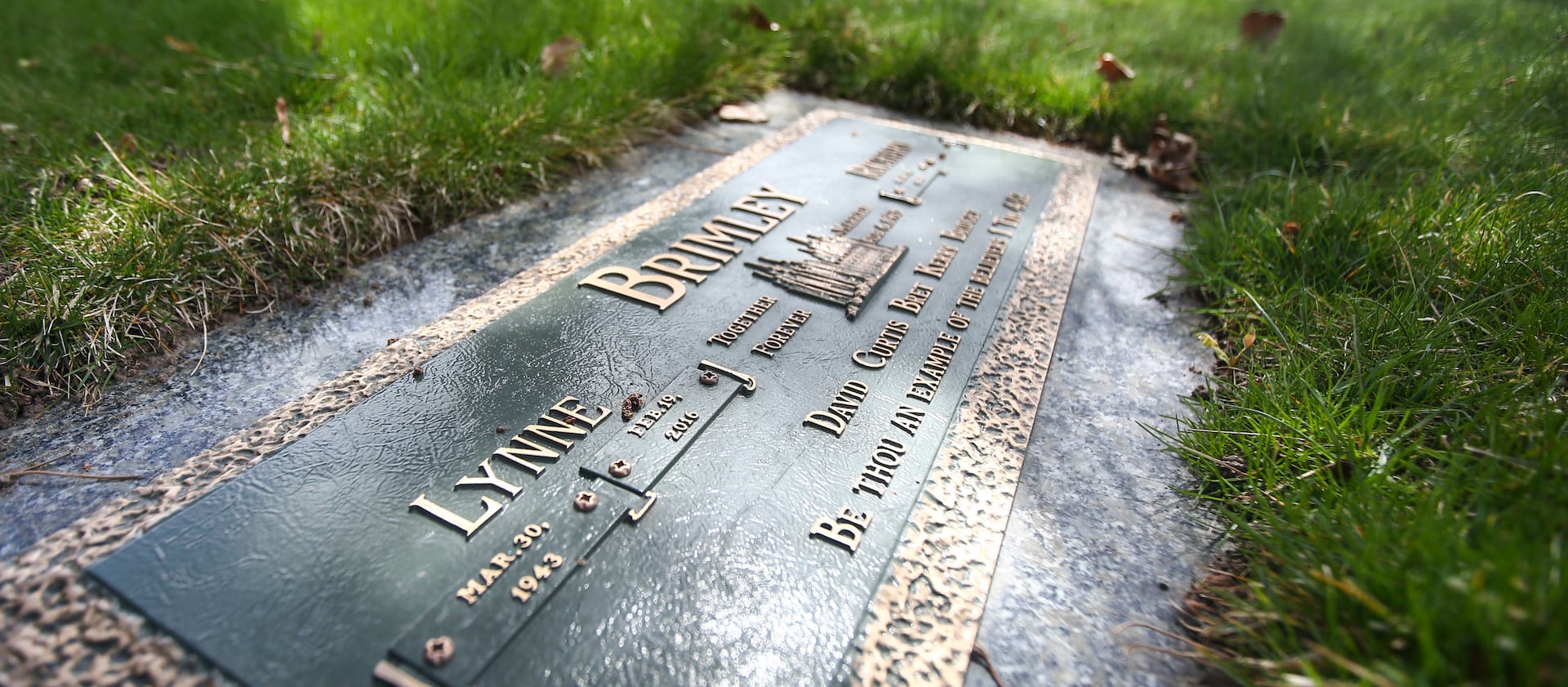 The grave site of Lynne Brimley, a mother of five and grandmother of 20, who went to Portica Body & Face for liposuction in 2016 and 24 hours later was dead, at Mountain View Memorial Estates Cemetery Salt Lake City on Friday, April 5, 2019.