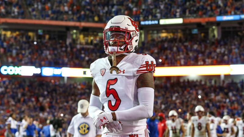 Utah cornerback Caine Savage (5) walks off the field after an NCAA football game against Florida on Saturday, Sept. 3, 2022 in Gainesville, Fla. Florida defeated Utah 29-26. (AP Photo/Gary McCullough)