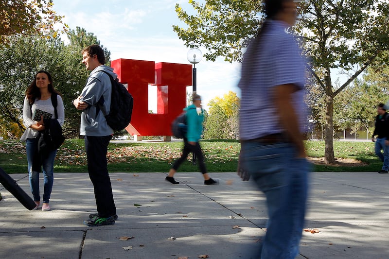 FILE - Students walk past the "block U" on the University of Utah's campus in Salt Lake City, Tuesday, Oct. 20, 2015. Freshly minted entrepreneurs looking to give their startups a boost can tap into a novel new graduate program unveiled Wednesday by the U
