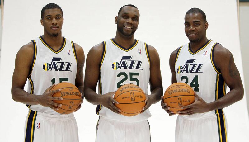 Utah Jazz players Derrick Favors, Al Jefferson, Paul Millsap is photographed during media day at the Zions Bank basketball center in Salt Lake City Friday, Dec. 9, 2011.