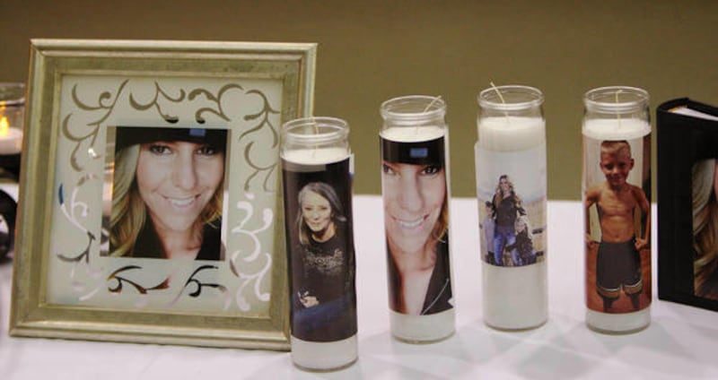 Friends honor Boren family members in Spanish Fork on Saturday, Jan. 18, 2014. The bodies of Kelly Boren, 32, Joshua Jaden Boren, 7, Haley Boren, 5, and Marie King, 55, and officer Joshua Boren, 34, were found Thursday night inside their Spanish Fork home