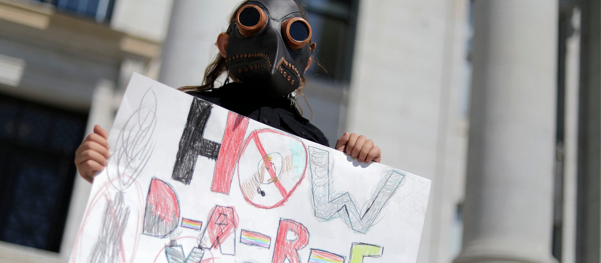 Zemirah Grossman, 9, of Salt Lake City, attends a Global Climate Strike at the Capitol in Salt Lake City.