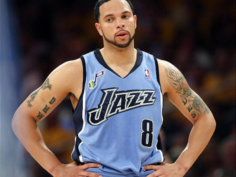 Utah Jazz point guard Deron Williams watches at the 3-point line during a foul shot as Jazz play the Los Angeles Lakers in Game 1 of the NBA Western Conference playoffs at the Staples Center in Los Angeles Sunday. The Lakers won 113-100 to take a 1-0 lead
