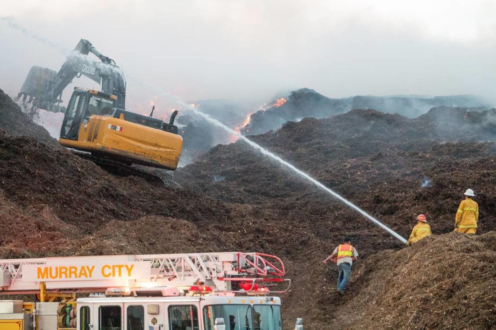 Compost fire in South Salt Lake closes roads, threatens businesses ...
