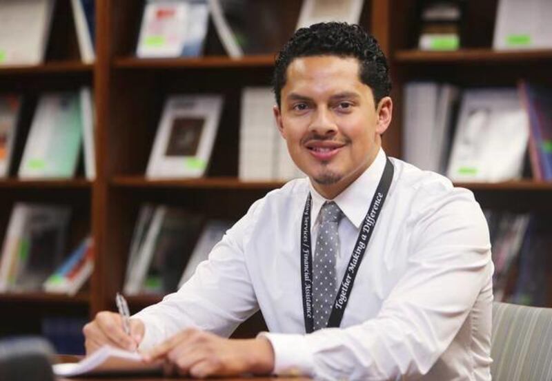Alberto Calderon helps with financial assistance for patients at Intermountain Medical Center in Murray on Thursday, June 6, 2013.