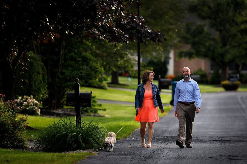 Christine Burke, 44, and her husband Jonathan Burke, 46, pictured at their Bethlehem, Pa., home, Wednesday, June, 12, 2019, have been married for 19 years and have two children. When they started having relationship issues they sought the help of a thera