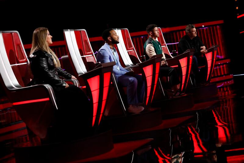 “The Voice” coaches Kelly Clarkson, John Legend, Nick Jonas and Blake Shelton take in the top five results.
