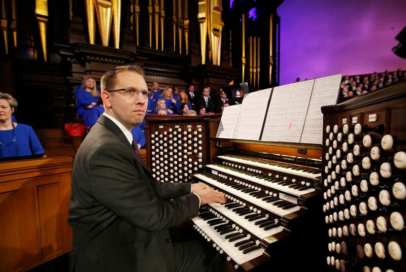 Tabernacle organist Brian Mathias plays with the Mormon Tabernacle Choir during "Music and the Spoken Word" in Salt Lake City on Sunday, March 11, 2018.
