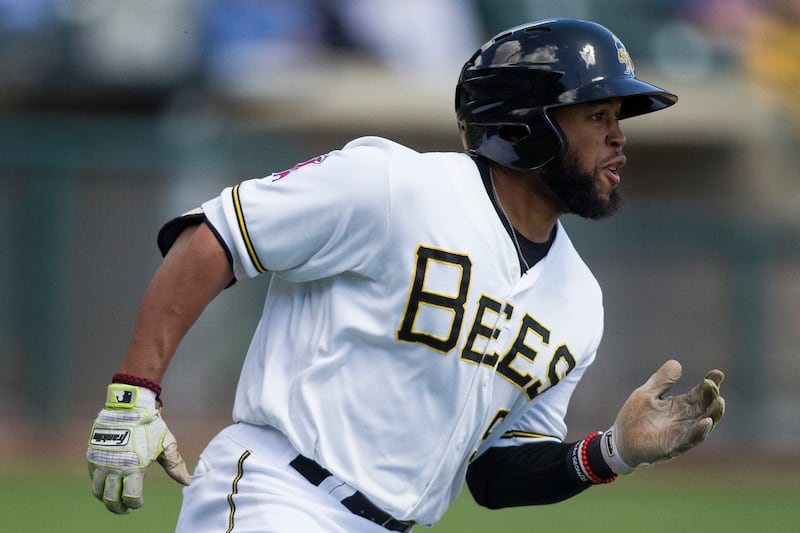 Salt Lake Bees infielder Sherman Johnson (5) makes his way to first during the Salt Lake Bees' 5-4 win against the Albuquerque Isotopes on Monday, April 9, 2018, at Smith's Ballpark in Salt Lake City. The Bees won after 11 innings of play. The Bees will h
