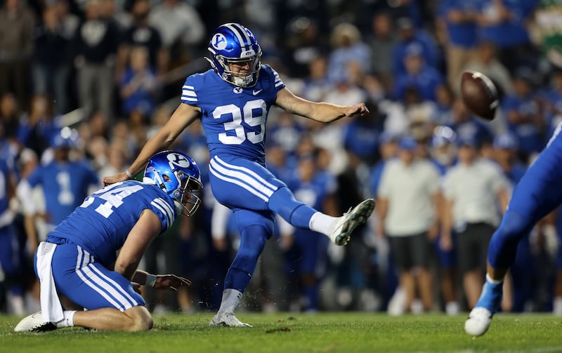 BYU place-kicker Jake Oldroyd kicks an extra point as BYU and Baylor play at LaVell Edwards Stadium in Provo, Sept. 10, 2022.