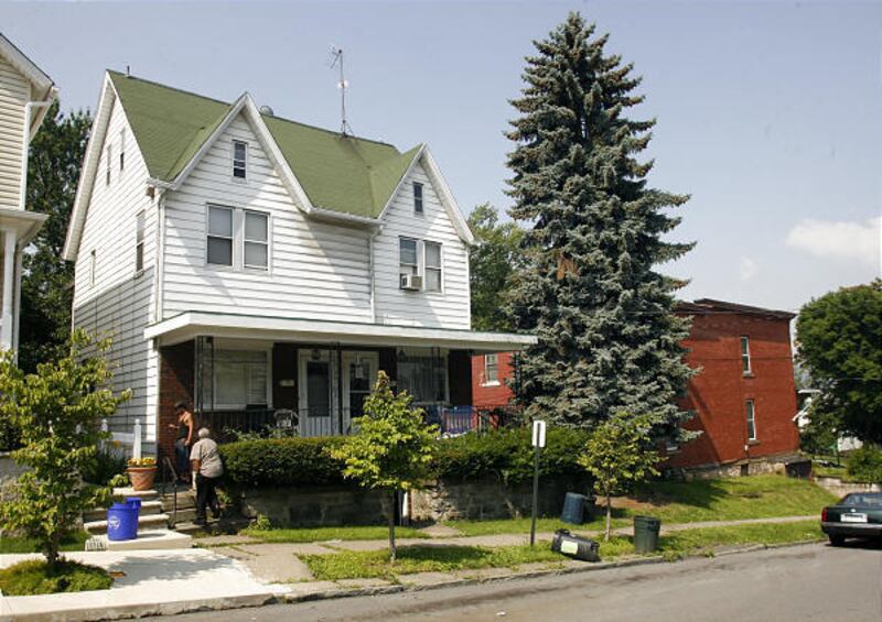 The double block home at 810 Myrtle St., at right, in Scranton, Pa., Thursday, July 16, 2009, is where Norwegian foreign exchange student Anne Bardoz lived for a time. Bardoz claimed the crowed three-room apartment floors were strewn with animal feces.