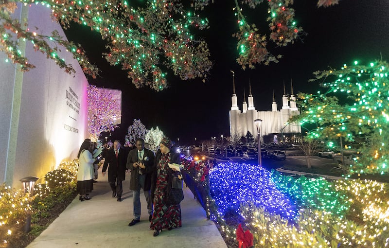 Ambassadors to the United States leave the Washington D.C. Temple Visitors’ Center after a lighting ceremony on Nov. 29, 2022.