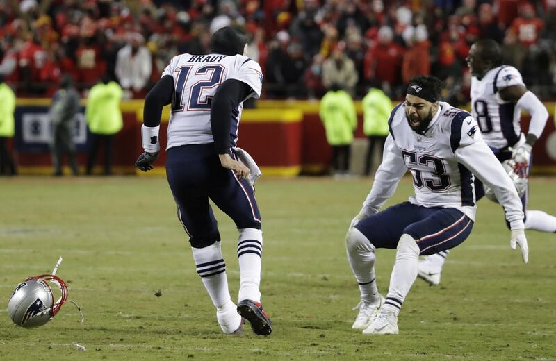 New England Patriots quarterback Tom Brady (12) celebrates with middle linebacker Kyle Van Noy (53) after defeating the Kansas City Chiefs in AFC Championship NFL football game in overtime, Sunday, Jan. 20, 2019, in Kansas City, Mo. (AP Photo/Elise Amendo