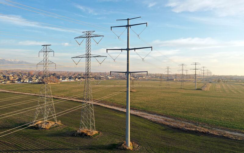 Power lines run through Roy on Tuesday, Nov. 30, 2021.