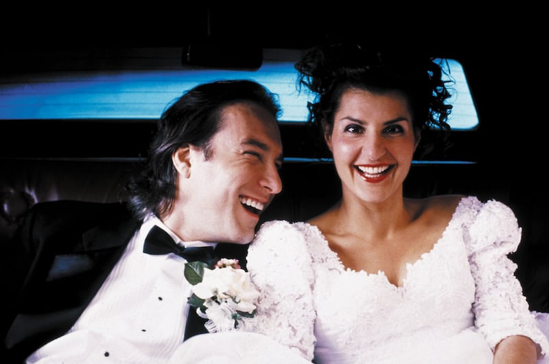 John Corbett Nia Vardalos in “My Big Fat Greek Wedding”
