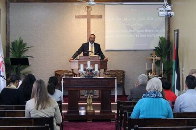 Guest pastor Kevin Brown, of New Jersey, delivers a Sunday morning sermon at the Baraka Church in the West Bank on March 17, 2018.